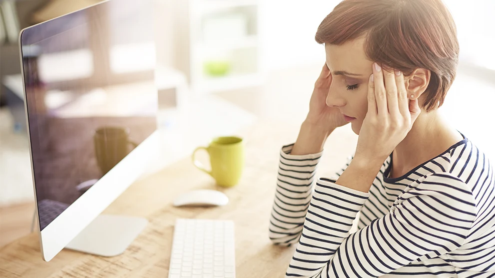 A women dealing with a headache